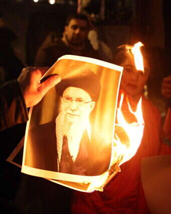 הפגנה בבריטניה נגד המשטר האיראני | EPA הפגנה בבריטניה נגד המשטר האיראני | EPA