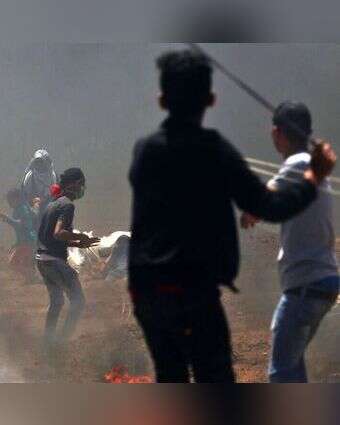 ילדים בהפגנות מול גדר הגבול עם עזה. | AFP ילדים בהפגנות מול גדר הגבול עם עזה. | AFP