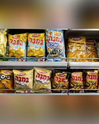 מדף חטיפים בסופרמרקט ישראלי. | אוליבייה פיטוסי/פלאש90 מדף חטיפים בסופרמרקט ישראלי. | אוליבייה פיטוסי/פלאש90