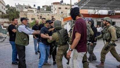 עימות בין חיילי צה"ל ליהודים ולפלסטינים, בשבוע שעבר בחווארה | AFP עימות בין חיילי צה"ל ליהודים ולפלסטינים, בשבוע שעבר בחווארה | AFP