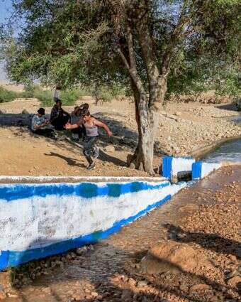 ישראלים ופלסטינים במעיין עוג'ה. | נאסר אישתאיה - פלאש 90 ישראלים ופלסטינים במעיין עוג'ה. | נאסר אישתאיה - פלאש 90