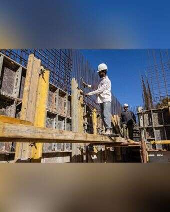 פועלי בניין הודים בישראל. | AFP פועלי בניין הודים בישראל. | AFP