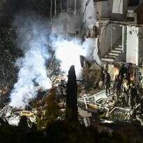 הריסות המבנה בחיפה שנפגע מטיל איראני | פלאש 90 הריסות המבנה בחיפה שנפגע מטיל איראני | פלאש 90