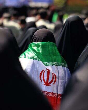 דגל הרפובליקה האסלאמית של איראן | ATTA KENARE / AFP דגל הרפובליקה האסלאמית של איראן | ATTA KENARE / AFP