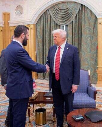 א־שרע וטראמפ בפגישה בריאד, מאי 2025 | איי.אף.פי א־שרע וטראמפ בפגישה בריאד, מאי 2025 | איי.אף.פי