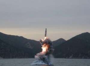 North Korea fires a ballistic missile from a submarine in April. | KCNA VIA KYODO